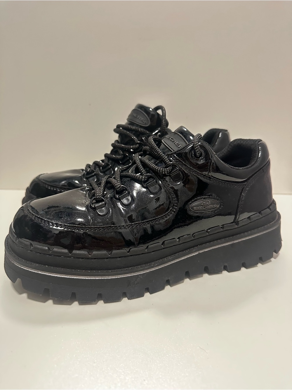 Skechers Jammers chunky sole sneakers in patent black